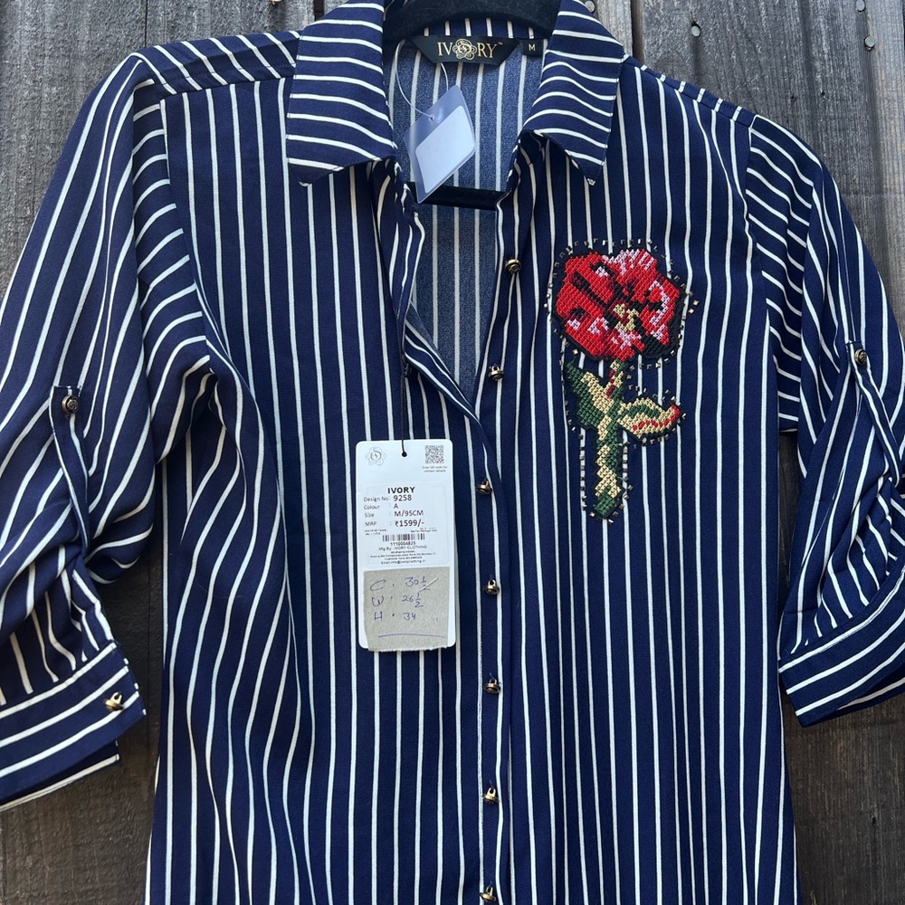 Beautiful blouse/Dress with Rose embroidered on top. New with tag.